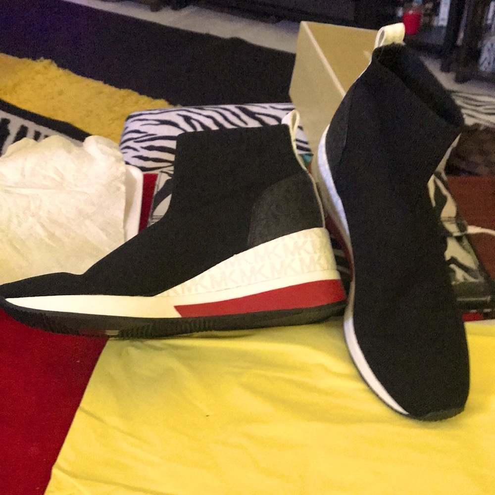 Never Worn MK high top wedge sneakers